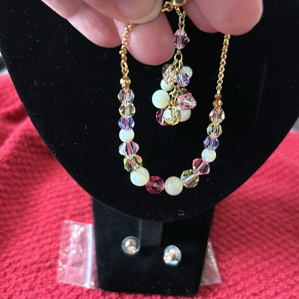 Swarovski set necklace, bracelet and earrings. EUC Pink, white, clear gold tone